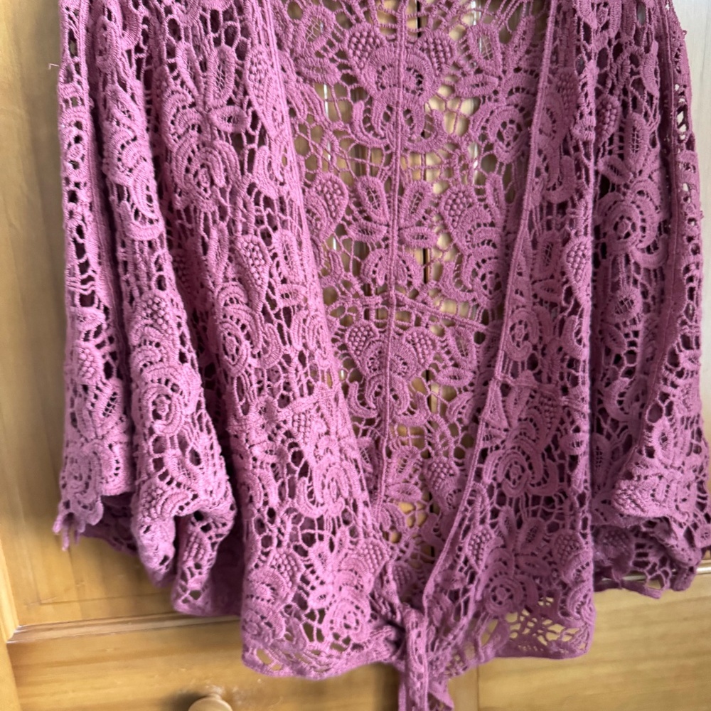 Crocheted shawl/sweater never worn. Beautiful rose color with no flaws.